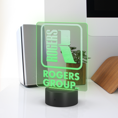 Rogers_Group_Inc_-_Branded_Neon_Sign_Rectangle_Lifestyle_Workdesk_Mockup.png